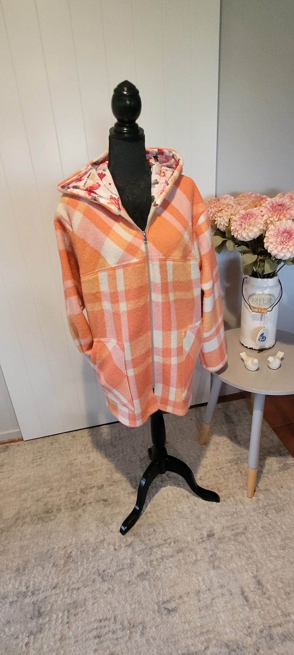 Charlie Coat Large in orange and pink plaid on a mannequin