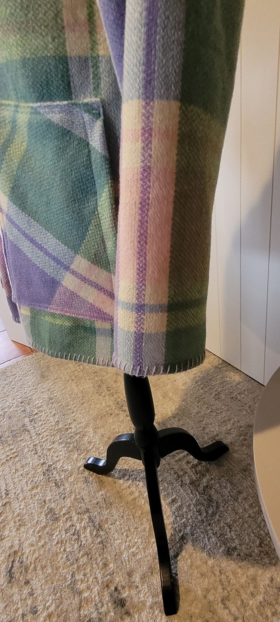 Thumbnail: Close-up of Charlie Coat hem in green and purple plaid
