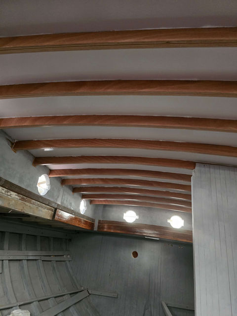 Wooden ceiling beams and interior lighting of a Sail Barbary