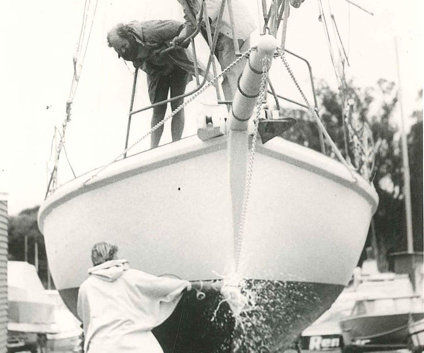 Crew cleaning sailboat; Sail Barbary