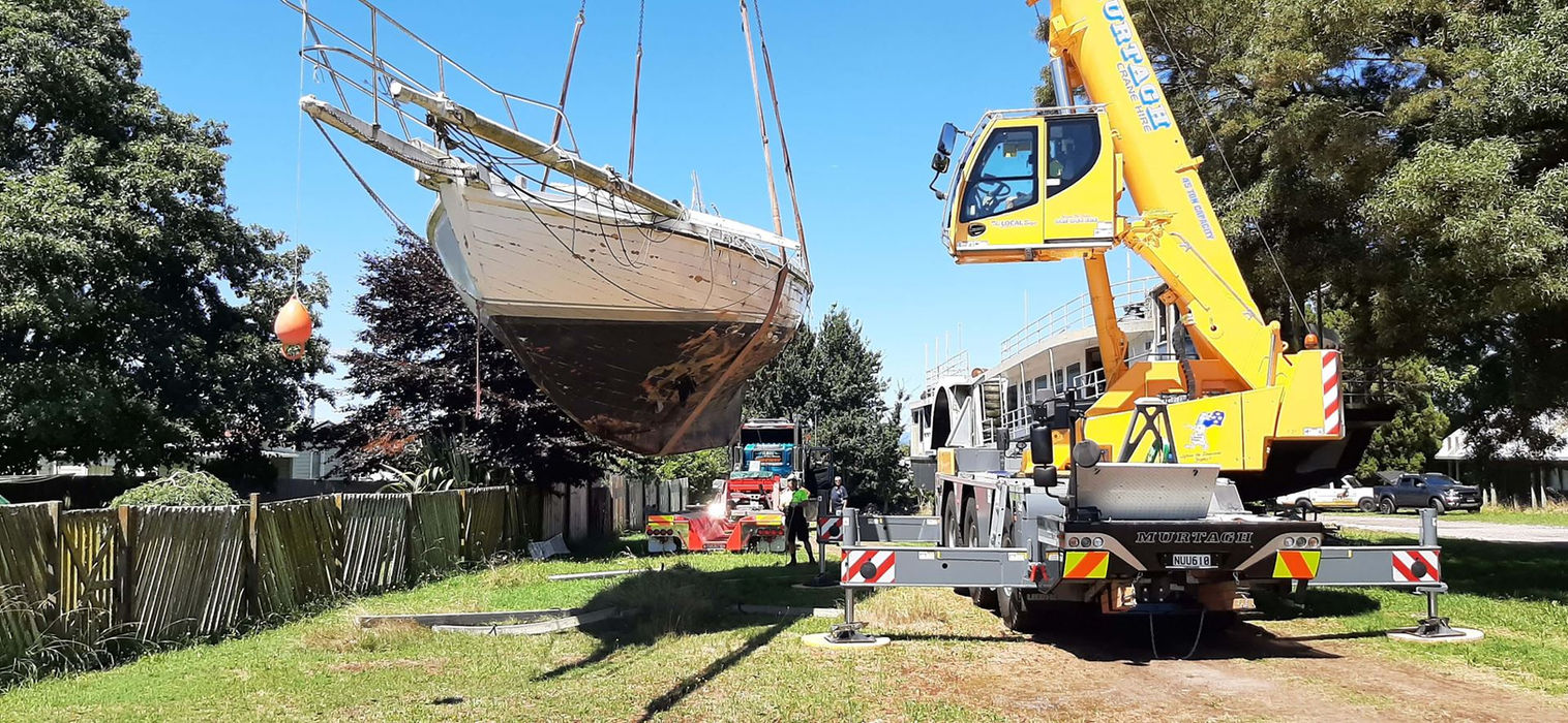 Crane lifting Sail Barbary