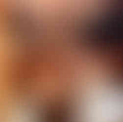 Compact onboard bathroom on Sail Barbary, showing small sink and toilet layout.