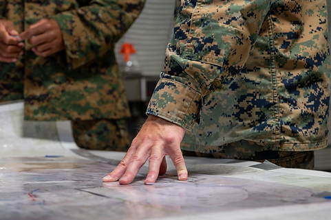 Hand on Map Photo_edited.png