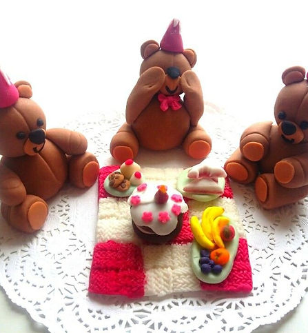 Teddy bears with hat on.jpg