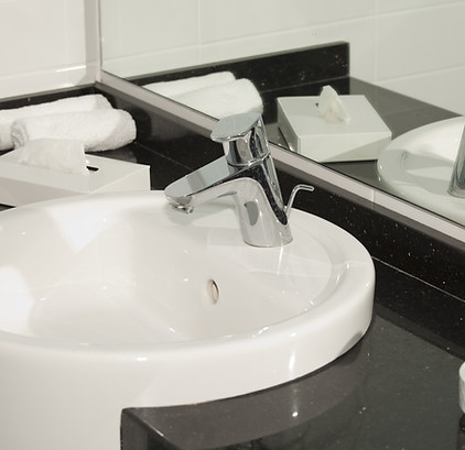Blocked sink being repaired