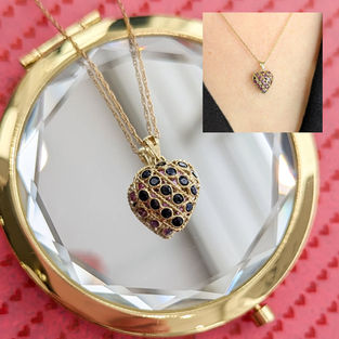 14kt Yellow Gold Reversible Sapphire and Ruby Heart Pendant with 18" chain