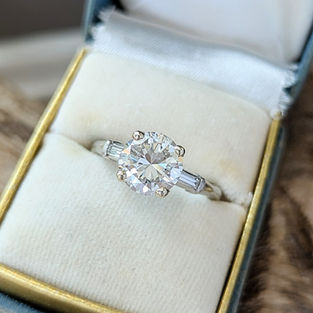 Mid-Century Platinum and 14kt White Gold Round Brilliant and Baguette cut Diamond Engagement Ring, 2.22ct center
