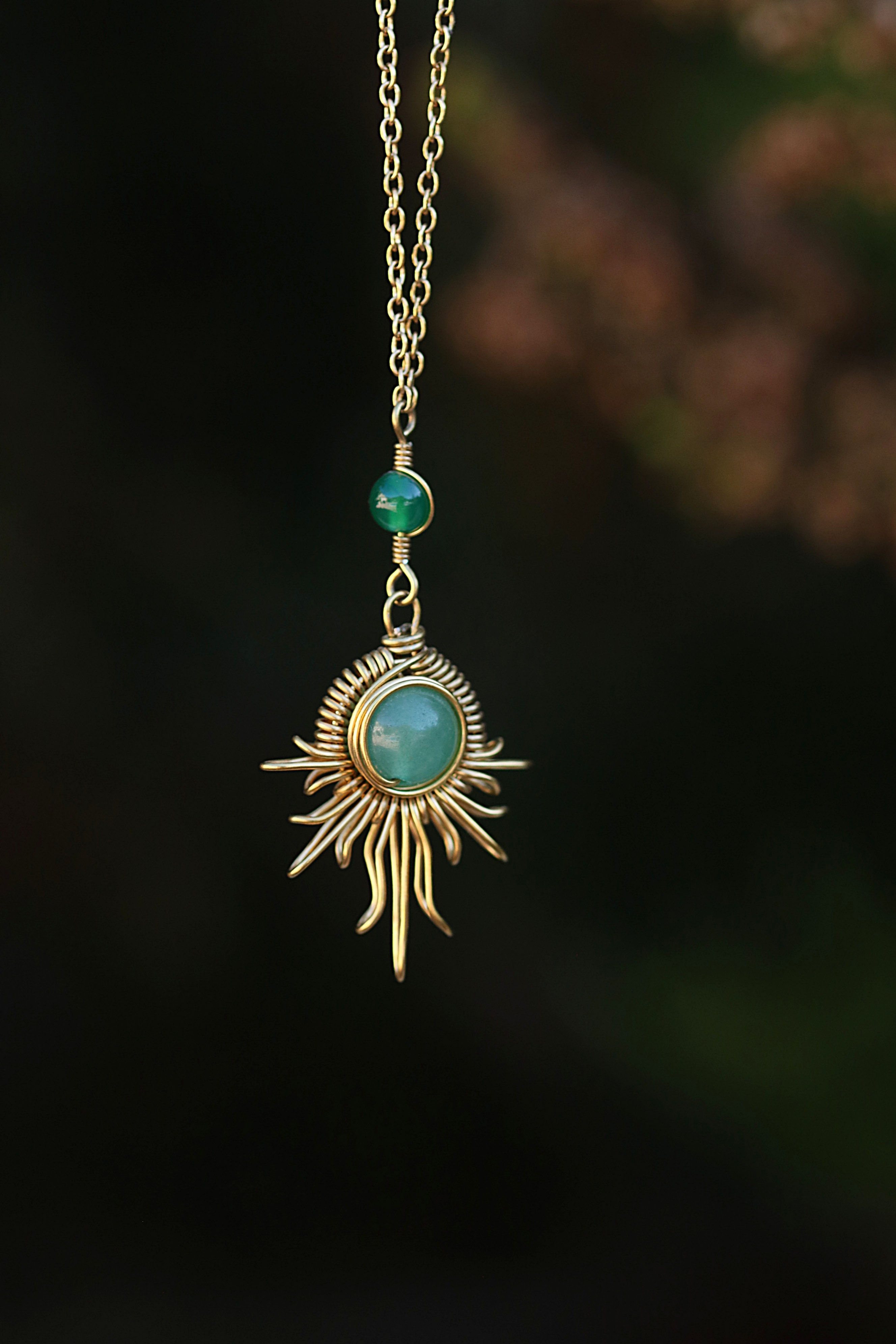 Collier soleil doré hélios en acier inoxydable