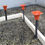 الصورة المصغرة: Industrial safety guard column | Black base + orange top cover | Ground fixed installation | Construction area isolation syst