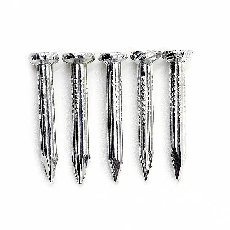 Five silver threaded nails neatly arranged