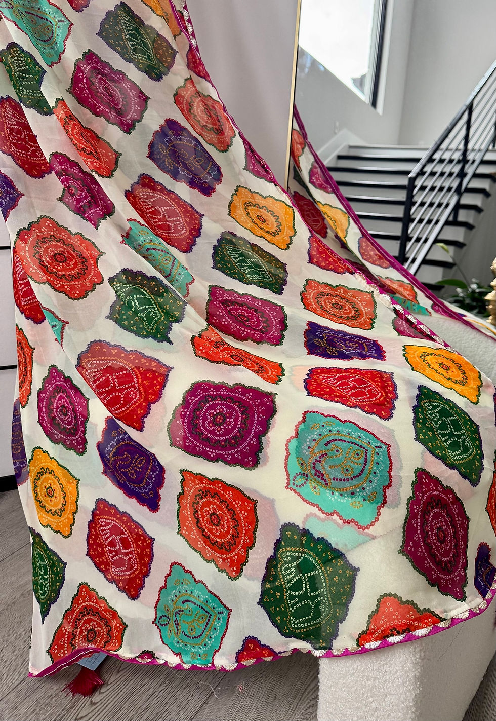 Thumbnail: Georgette bandhini print saree with stitched blouse