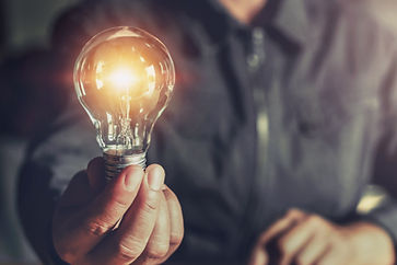 vecteezy_hand-holding-light-bulb-idea-concept-with-innovation-and_7449169_421.jpg