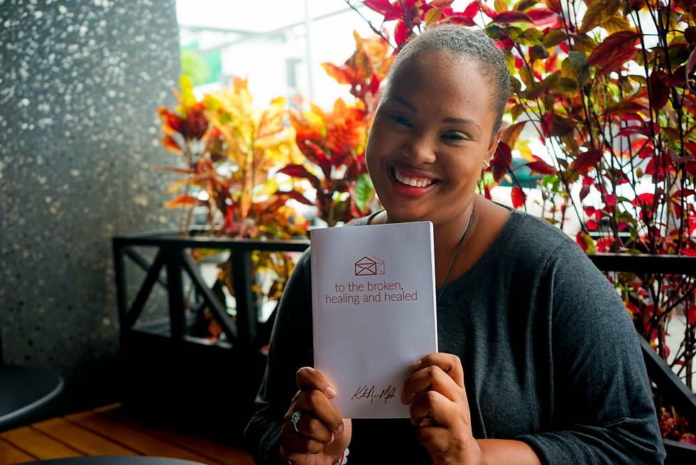 Katrina McIntosh founder of Persons With Mental Illness (PWMI) showcasing her book, "Letters to the Broken, Healing & Healed."