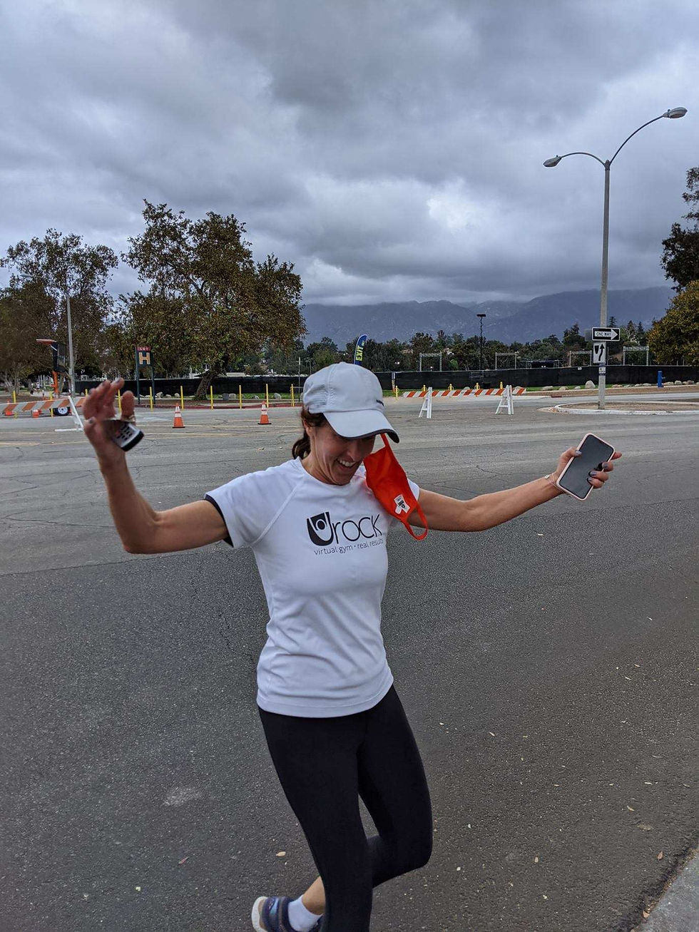 Stacey Sharp femal founder of Urock Fit Zoom gym at the finish line of her Urock style Tri.