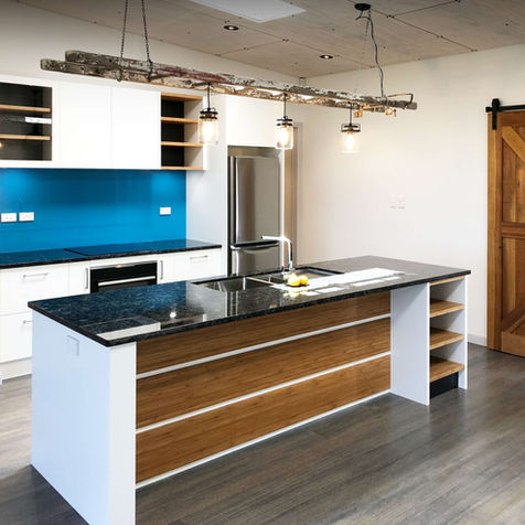 blue back-painted glass splashback