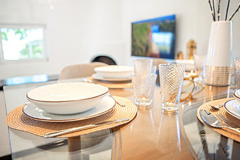Premium dining setup and glassware ready for an authentic alfresco or indoor family feast.