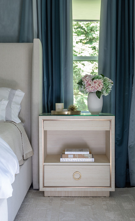 Luxury Oyster Bay bedroom interior design with serene palette, upholstered headboard, and layered textures