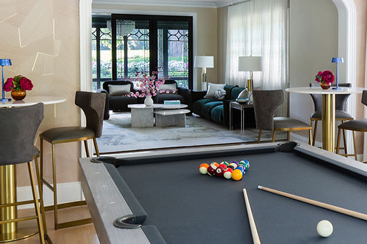 Lloyd Harbor interior designer lounge with billiard table, custom finishes, and entertainment-focused design