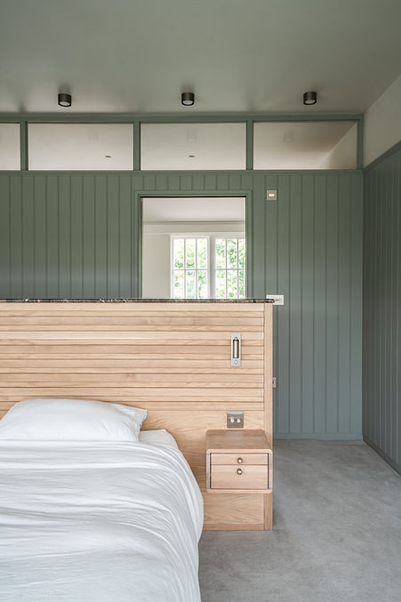 Online interior design result — bespoke bedroom with Farrow and Ball Pigeon wardrobes, remote design project London by SJG Studio