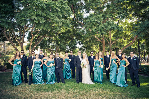 Wedding party poses for photo, bride, groom, bridesmaids and groomsmen at Founders chapel.