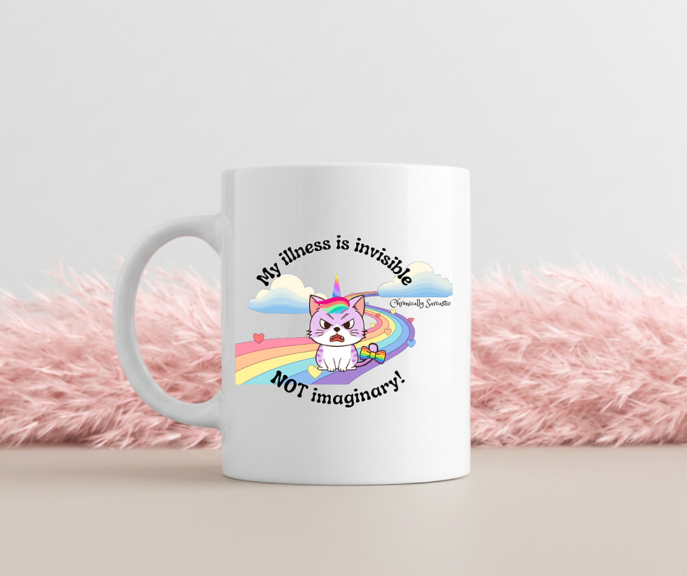 Thumbnail: All white mug on a white background with fuzzy pink rug with "My Illness is invisible, NOT imaginary" emo unicorn cat design