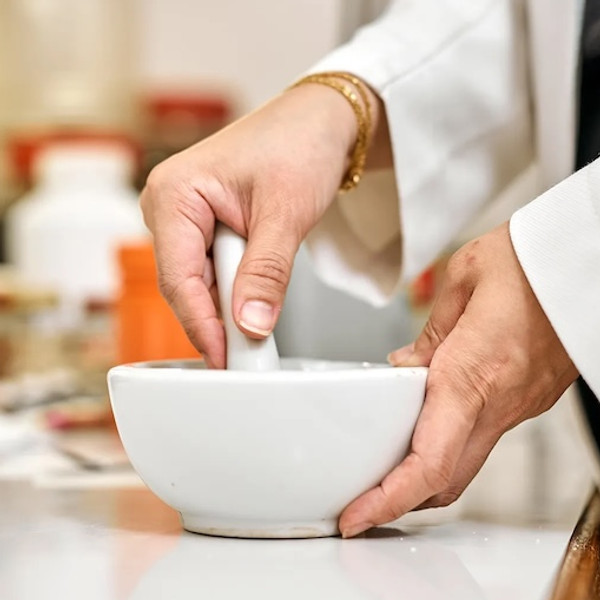 Pharmacist compounding medication