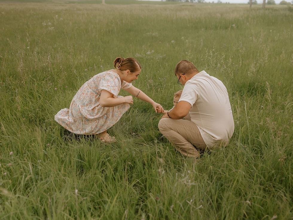 This dreamy Nebraska family session captures barefoot moments in the garden with strawberr