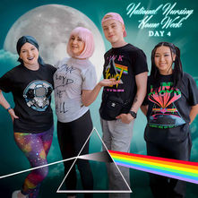 Staff members dressed in Pink Floyd shirts posing together during Pink Floyd-themed activities for National Nursing Home Week.