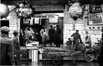 Portobello Road market stall holder's POV, locals in foyer of Electric Cinema.