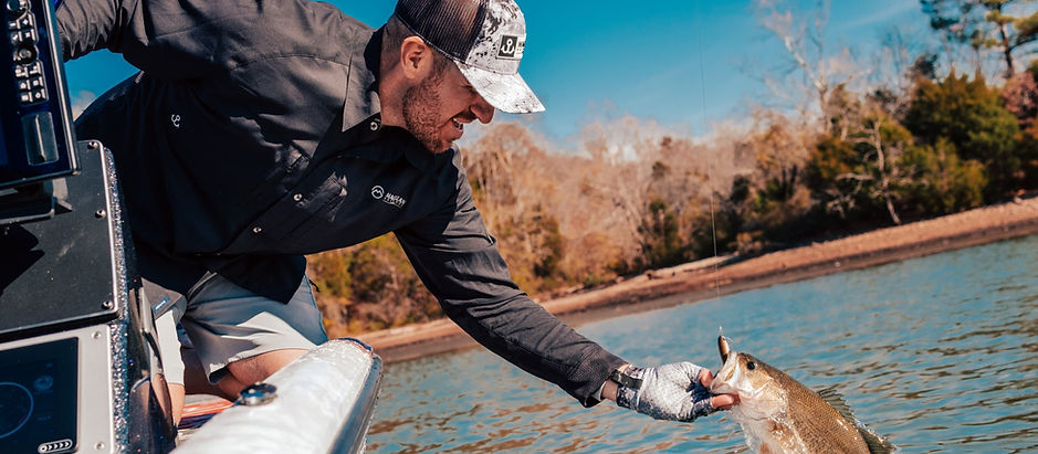 Jacob-Wheeler-Grabbing-Fish.png