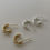 Thumbnail: 18K Gold Twisted Rope Earrings on table