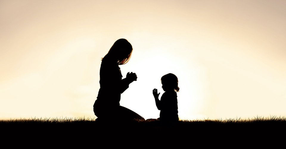 15803-silhouette-prayer-family-gettyimages-11630776.jpg