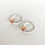 Thumbnail: sterling silver hoops with carnelian beads hand-strung in a loop dangling off of hoops