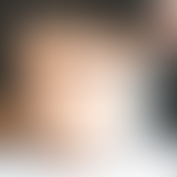 Applying crumb coat to chilled cake with offset spatula