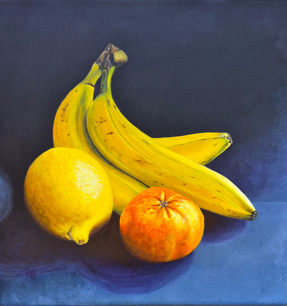 A lemon, orange and bunch of bananas