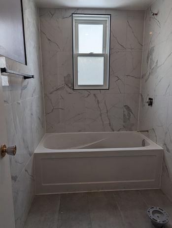 new bathtub install in bathroom renovation