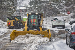 Clearing snow with plow in Thunder Bay