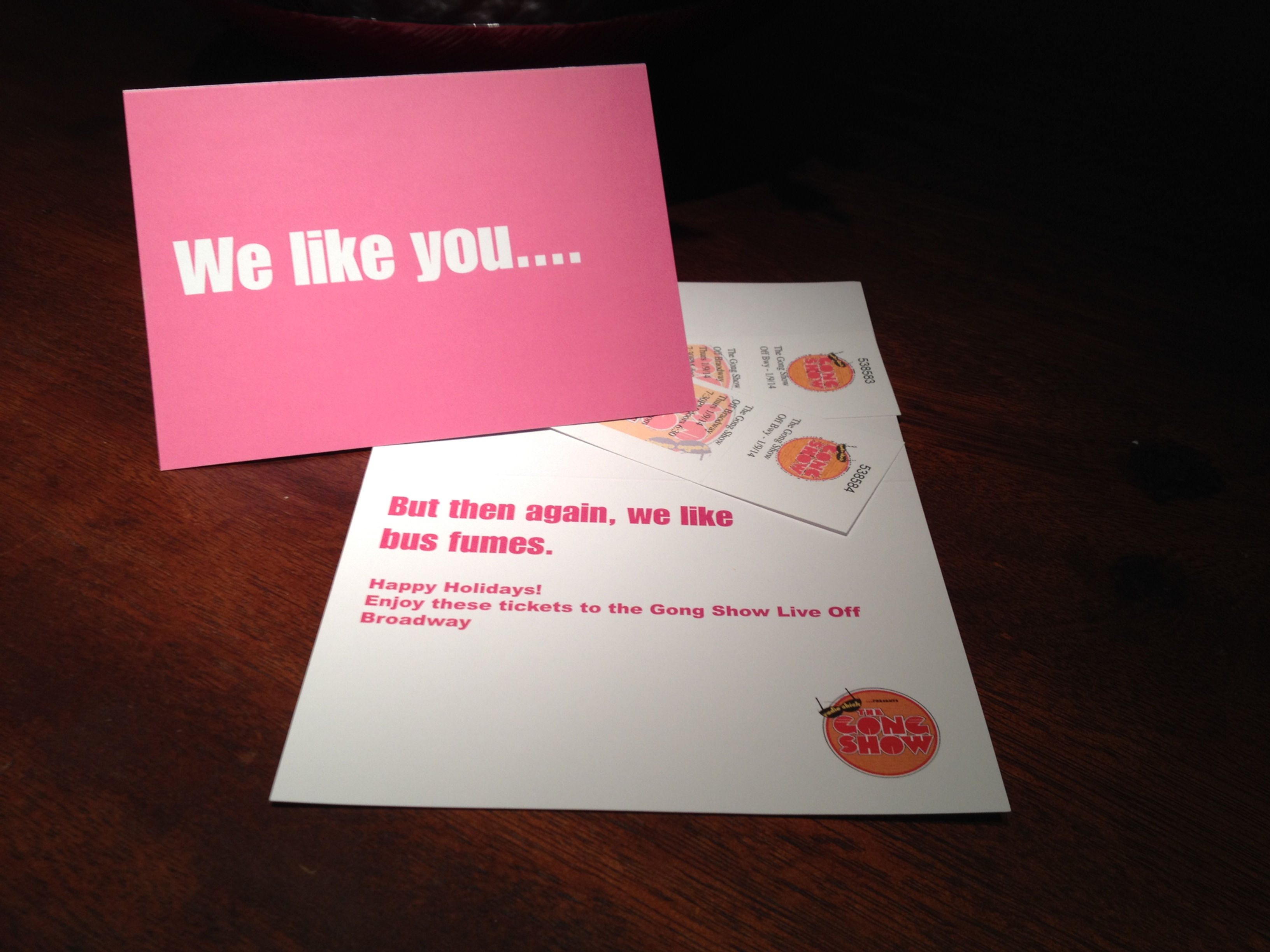 Happy Holidays card and 2 tickets