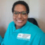 Brooke Keaton smiling in teal C19 Longhauler Advocacy Project shirt