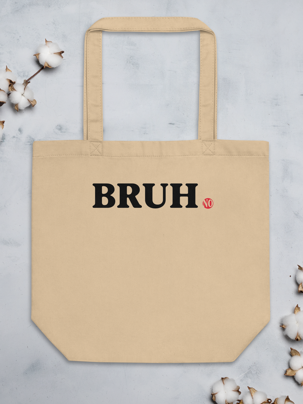 Beige tote bag with BRUH in black lettering