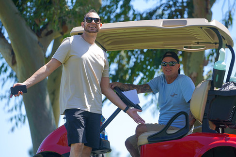 Two men at Laguna CC golf cart