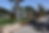Monterey Zoo pathway with benches, and animal enclosures