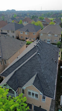 New asphalt shingle installation on a multi-unit residential roof in the GTA.