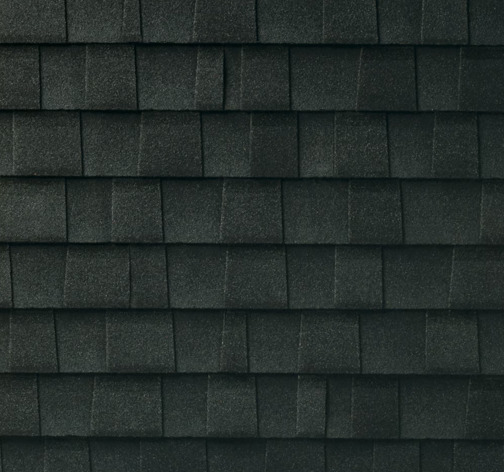 Charcoal asphalt shingle sample showing deep grey tones for Toronto and GTA roofing projects.