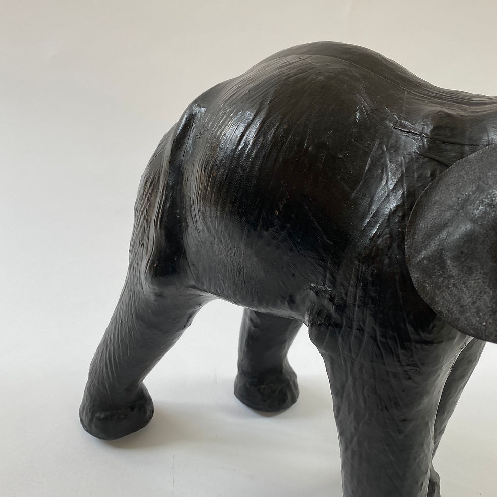 Thumbnail: Vintage Liberty-style leather elephant with raised trunk
