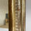 Thumbnail: Antique French Louis Philippe mirror with gold gilt frame with striped pattern, and mercury plate.