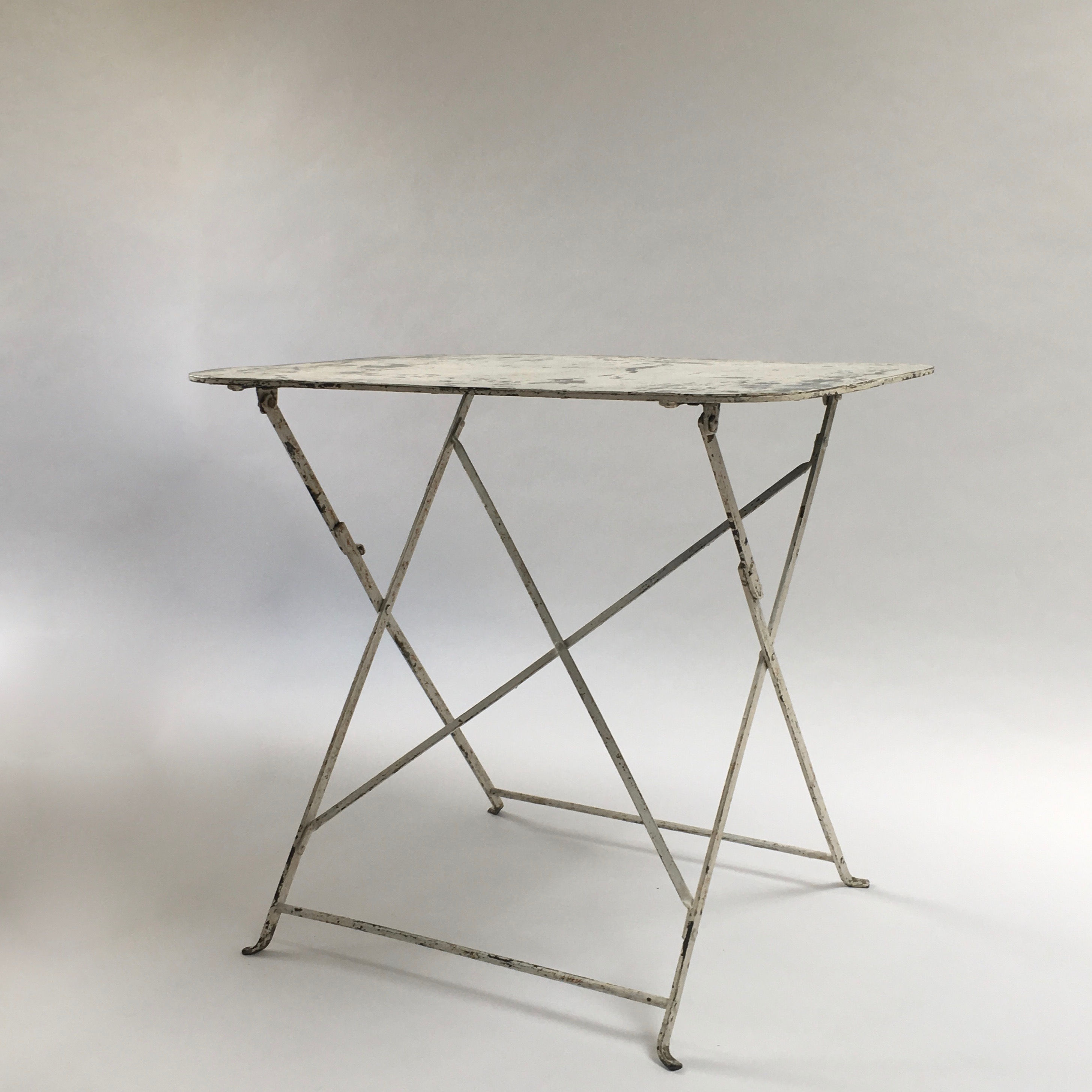 Vintage French rectangular white wrought iron folding garden table with beautiful patina