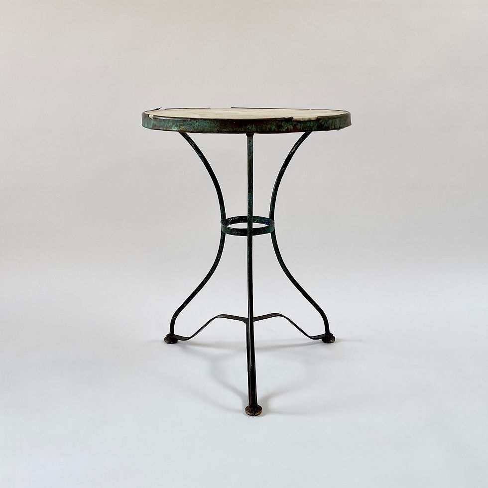 French marble top bistro table a wonderful patina of old green and blue paint layers.