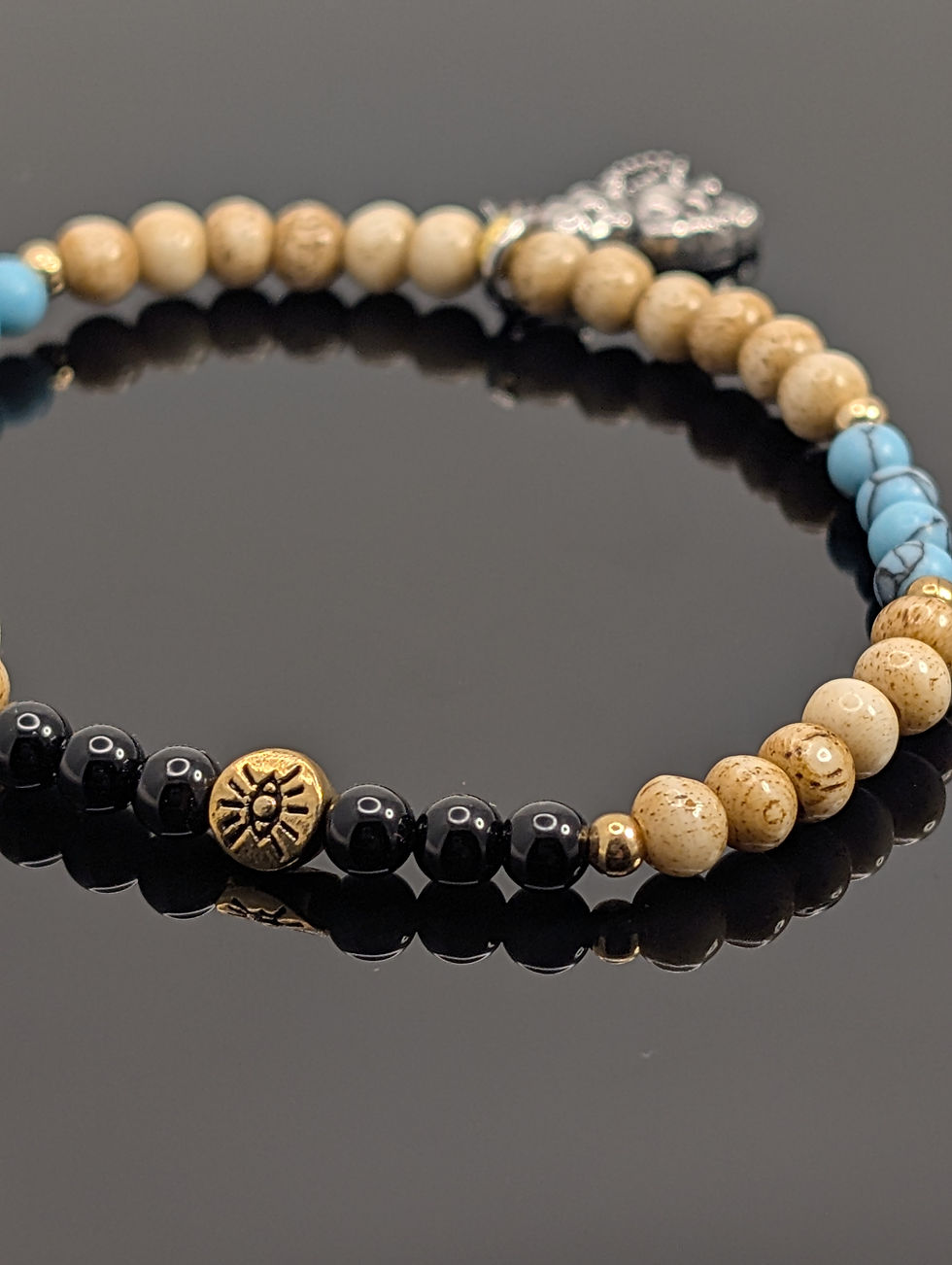 Thumbnail: Turquoise, Onyx + Bone - Charm Edition Karma Bracelet 