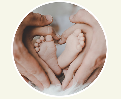 Mum and dad holding baby's foot